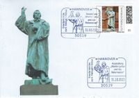 Diakon David Scherger, Pfarrer Holger Schmidt, Geo M&uuml;ller - Stempel M&uuml;ller e.K., N&uuml;rnberg, Ausstellung &bdquo;Martin Luther und die Reformation&ldquo; Hannover, Luther Briefmarken, Luther Sonderstempel 2023,